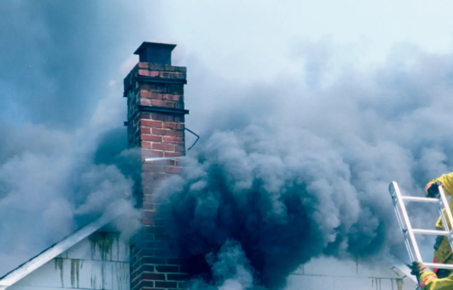 Smoking roof with chimney